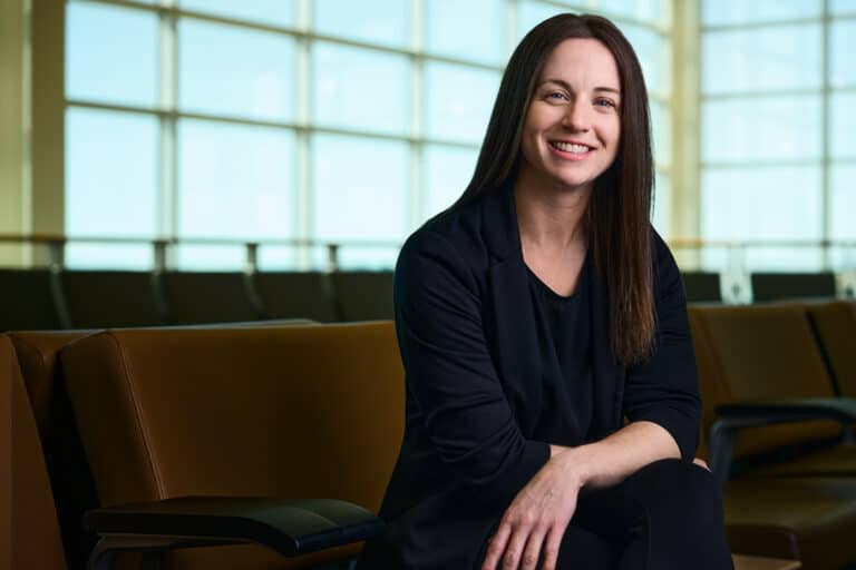 Image of Courtney Burns at the YQM airport.